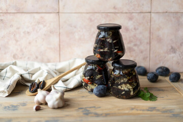 Jar-dried plum appetizer. Autumn canning