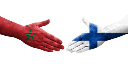 Handshake between Finland and Morocco flags painted on hands, isolated transparent image.