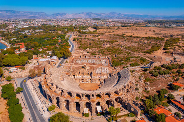 Antique amphitheater of ancient Side city Antalya Turkey drone photo, aerial top view
