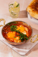 Shakshouka in a copper pot