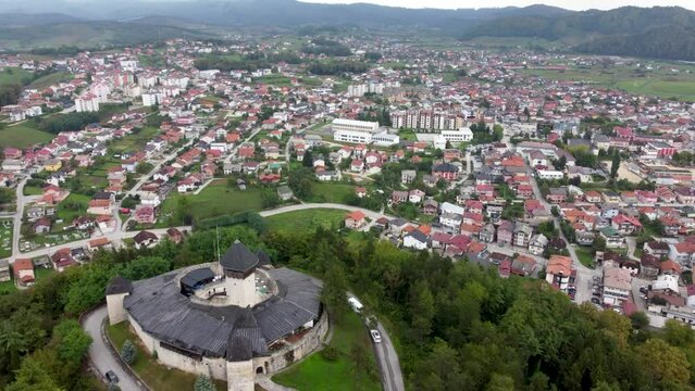 Velika Kladusa, Bosnia and Herzegovina, aerial drone view. Buildings, streets and residential houses. Velika Kladu&scaron;a is a town and municipality in western BiH. Castle and medieval walls on hill.