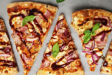 background of pizza food close-up pizza with chicken and dark sauce and basil. Vertical horizontal background of pizza slices. Pizza Day