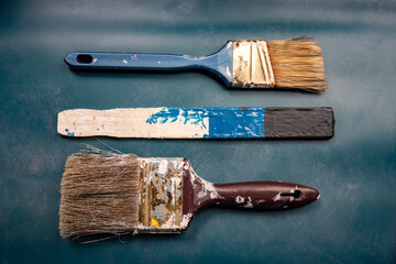 Paint brushes and stirring stick