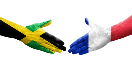 Handshake between France and Jamaica flags painted on hands, isolated transparent image.