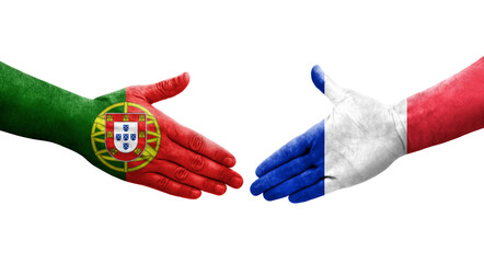 Handshake between France and Portugal flags painted on hands, isolated transparent image.