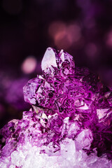 artificially stained (painted) quartz to look like an amethyst. pink, purple macro detail texture...