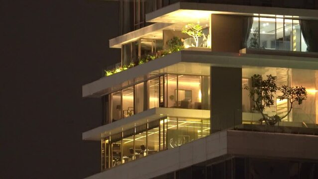 Lighted Building Of A Luxury Apartment With Private Gym