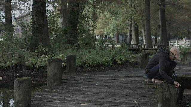 Young Woman Enjoys Nature Photography at Reelfoot Lake State Park 4K