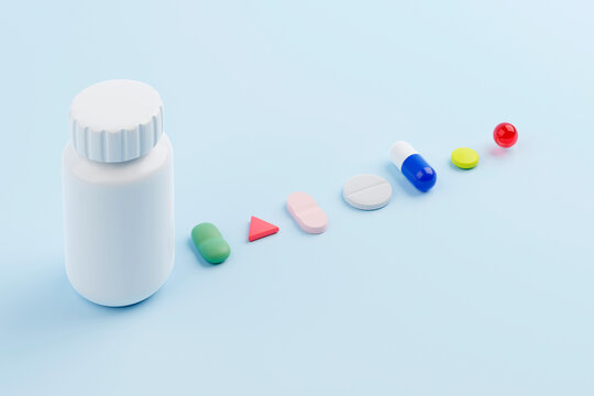 Various pills and medicine on a blue background.