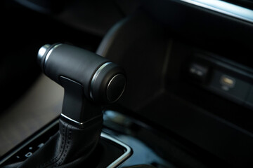 Close-up of automatic gearbox handle in the modern car