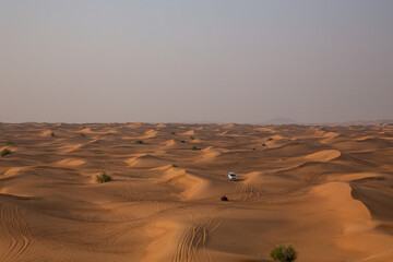 off-roading in sand dunes of desert