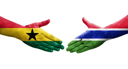 Handshake between Gambia and Ghana flags painted on hands, isolated transparent image.