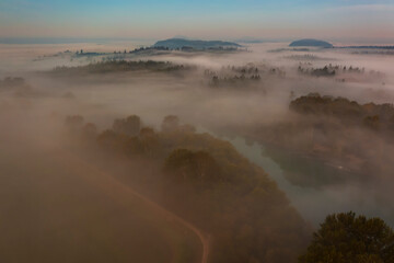 Misty Autumn Morning Sunrise Overlooking the Mighty Skagit River. Aerial drone view of the Skagit...