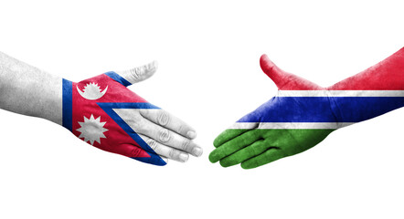 Handshake between Gambia and Nepal flags painted on hands, isolated transparent image.