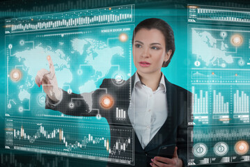 Young business lady works with virtual graphic interface in futuristic office