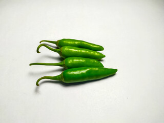 Fresh green chili pepper isolated on a white background. Green chili image.