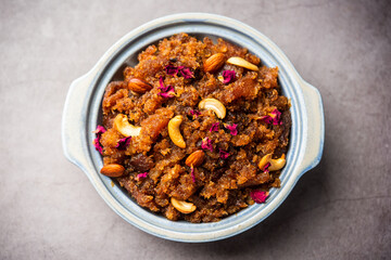 bread halwa also called halva, sheera, pudding or suji is an instant sweet dish from India