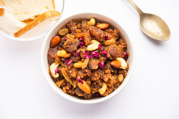 bread halwa also called halva, sheera, pudding or suji is an instant sweet dish from India