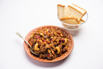 bread halwa also called halva, sheera, pudding or suji is an instant sweet dish from India