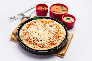 Cheese uttapam pizza, south Indian food with a twist. served with sambar and chutney