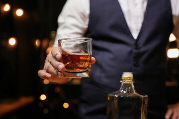 Barman pouring whiskey whiskey glass beautiful night