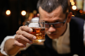 Barman pouring whiskey whiskey glass beautiful night