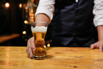 Barman pouring whiskey whiskey glass beautiful night