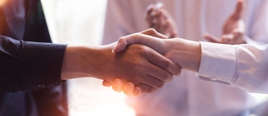 Businessman handshake for teamwork of business merger and acquisition,successful...