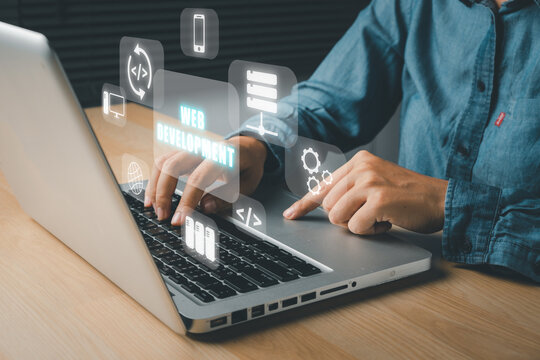 Web development concept, Person using a laptop computer with web development on vr screen, writing codes and data code, Programming with HTML, PHP and javascript.