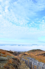 Obraz premium Mt Kurikoma is a volcano on the prefectural borders of Akita, Iwate and Miyagi. It is famous for having a wide range of mountain plants and amazing fall foliage. It is known as one of Japan’s best Mt.