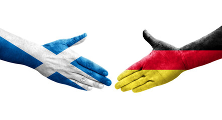 Handshake between Germany and Scotland flags painted on hands, isolated transparent image.