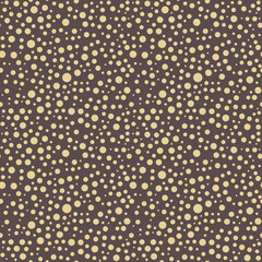 Fototapeta premium Seamless background with random elements. Abstract ornament. Dotted abstract brown and golden pattern