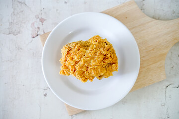 Fried chicken crisp, fast food meal on a white plate 