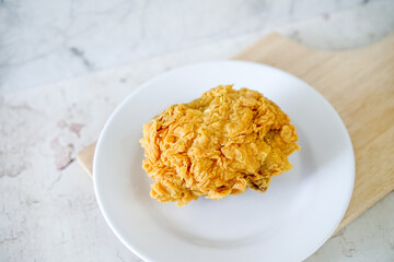 Fried chicken crisp, fast food meal on a white plate 