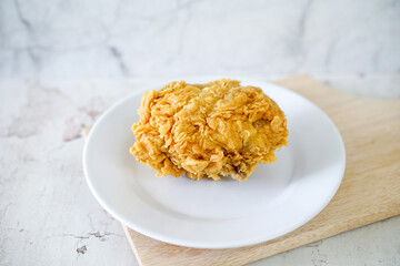 Fried chicken crisp, fast food meal on a white plate 