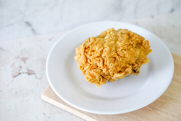 Fried chicken crisp, fast food meal on a white plate 