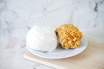 Fried chicken crisp with rice, fast food meal on a white plate 
