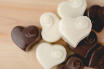 Heart chocolate on wood
