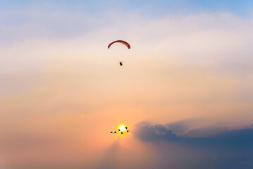 Paramotor flying on the sky, Paramotor flying on the sky ,adventure man active extreme sport pilot flying in sky with paramotor