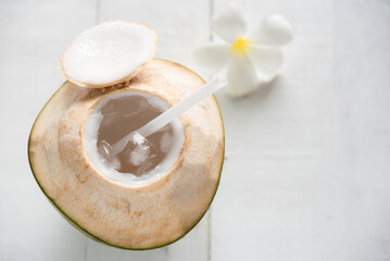 Fototapeta na wymiar coconut juice . Fresh coconut water, young coconut drink.