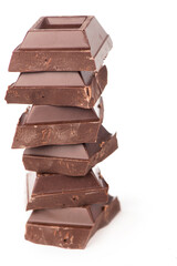 chocolate pieces. dark chocolate bars stacked high