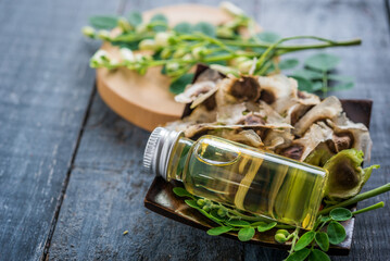 Moringa Oil and seeds, The seeds of the Moringa tree are pressed oil known as Ben Oil yellow