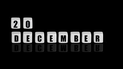 December 20th. Day 20 of month, Calendar date. White cubes with text on black background with reflection.Winter month, day of year concept