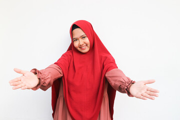 Offering hug of Beautiful Asian Woman Wearing Hijab Isolated On White Background