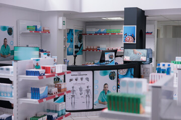 Empty pharmaceutics shop filled with medicaments and vitamins on shelves, prescription treatment...