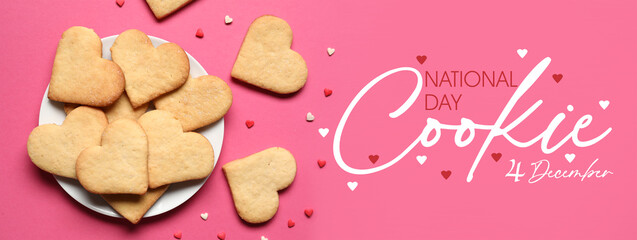 Plate with tasty heart shaped cookies on pink background. National Cookie Day