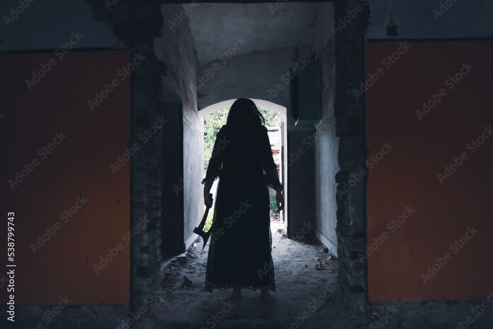 Wall mural Scary ghost woman in haunted house