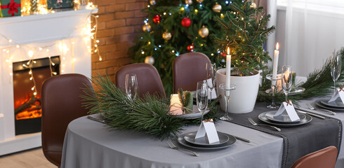 Dining table with festive setting for Christmas celebration at home