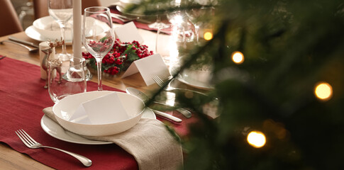 Festive table setting for Christmas celebration at home