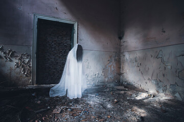 Scary ghost woman in haunted house